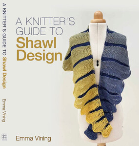 Book cover showing a shawl in blue and yellow on a dress form. The book is called A Knitter's Guide to Shawl Design.