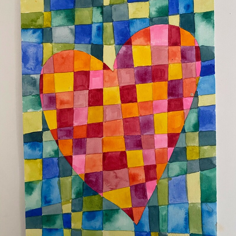 a photo of a painting of a colourful heart that has been created using a mosaic of small painted squares all put together to make a heart shape.
