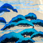 A bright blue printed design on fabric