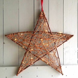 A woven Willow Christmas star decoration