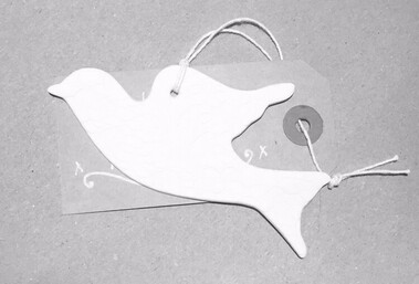 A white porcelain Christmas decoration of a dove