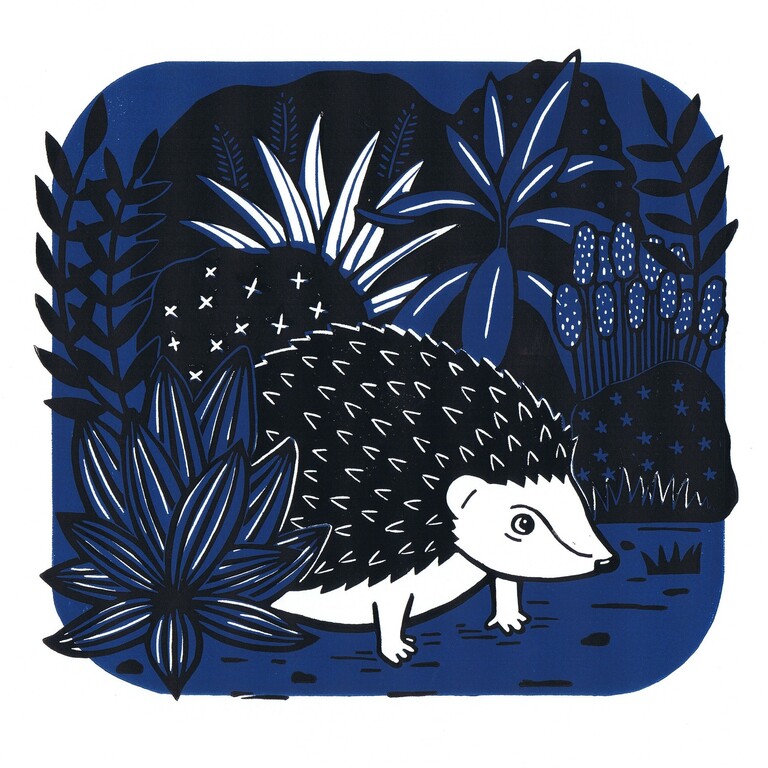 A lino print of a hedgehog at nighttime in a garden