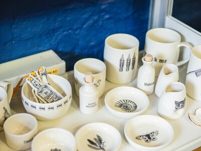 A craft Stall with ceramic bowls and mugs at the festival of crafts