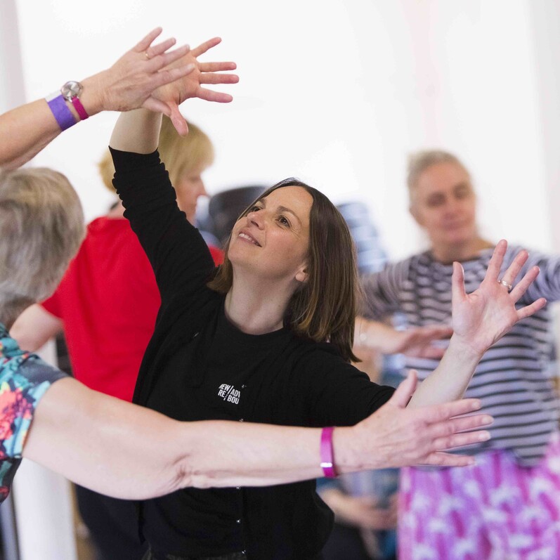 A group participate in an over 55's Dance workshop