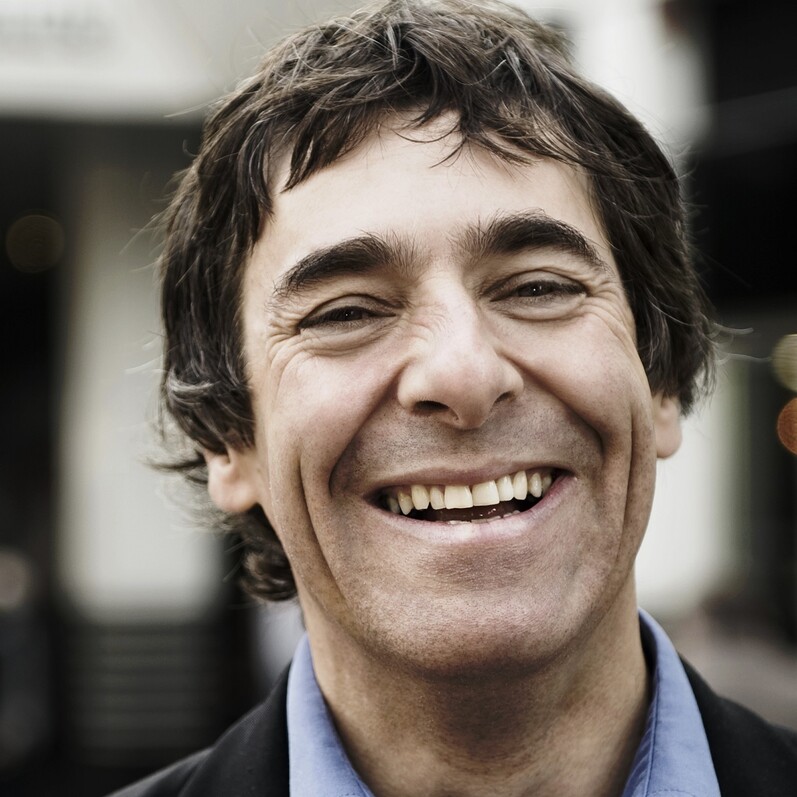 Headshot of comedian Mark Steel
