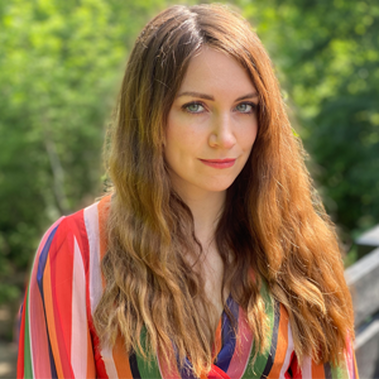 Fiona Fey outside in front of greenery