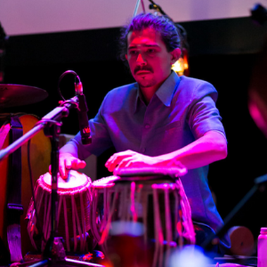 Camilo Tirado on drums on stage