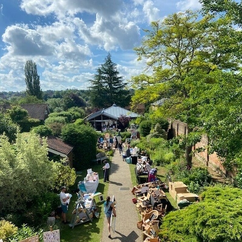 Aerial view of the museum garden set up for a market