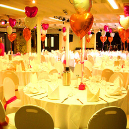 Cellar bar Event Room with tables, chairs and balloons decorated for a party