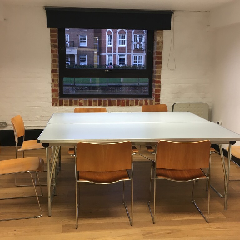 Small Room with table and chairs and large window